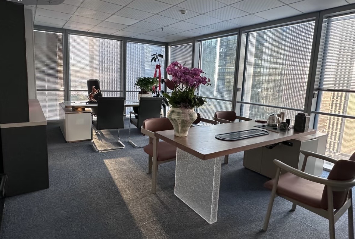 Gaga Sourcing office workspace with desks and meeting area
